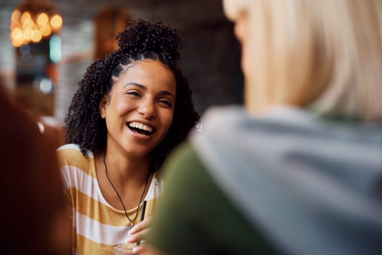 Young Black Woman Laughing While Being With Her Fr 2024 12 13 17 09 32 Utc 768x512 1